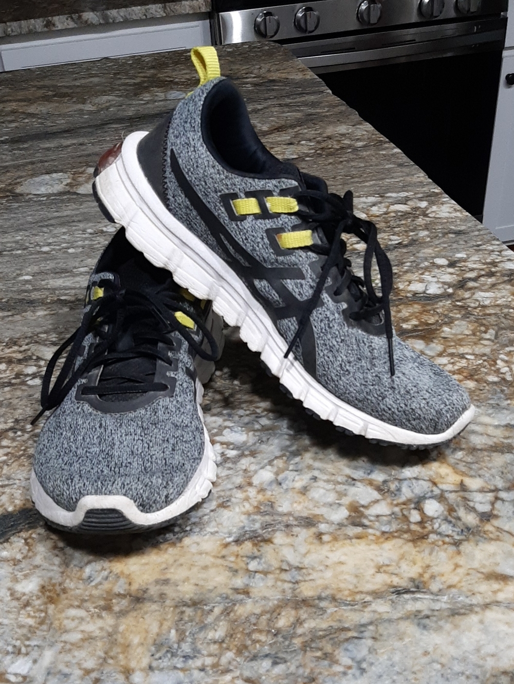 Women's Grey Asics Athletic Running Shoes with Yellow Accents Sz 9